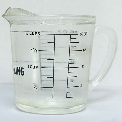 TWO VINTAGE FIRE-KING 2 CUP JUGS, 1 LOT