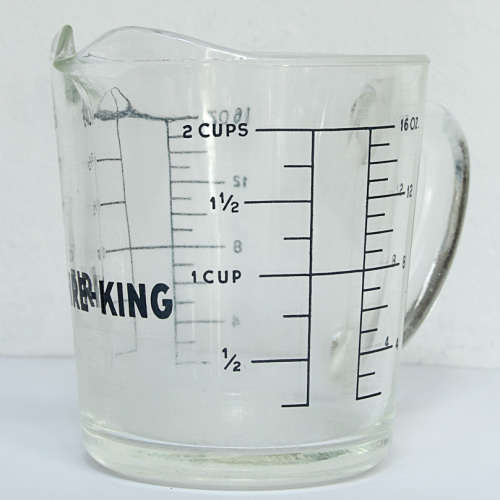 TWO VINTAGE FIRE-KING 2 CUP JUGS, 1 LOT