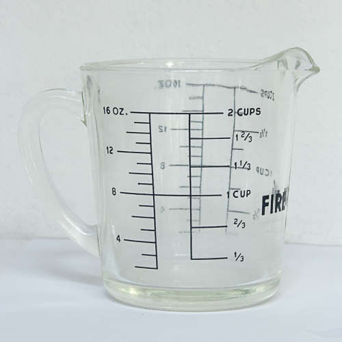 TWO VINTAGE FIRE-KING 2 CUP JUGS, 1 LOT