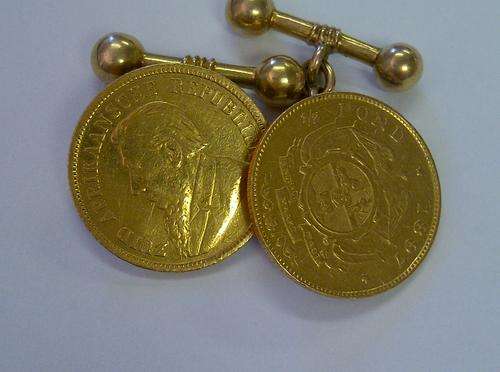 One pair 1895 and 1897 Paul Kruger 1/2 pound 22ct gold cuff links 9ct