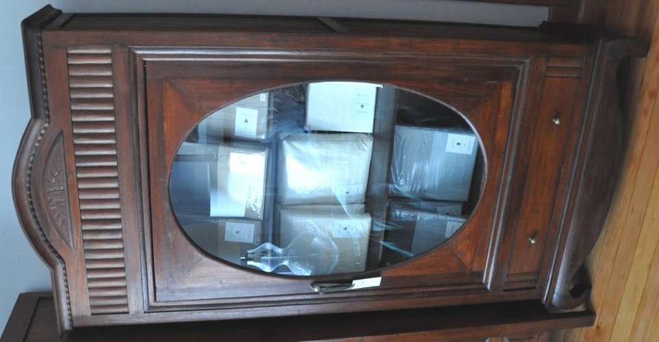 French Colonial Cupboard - PRICE REDUCED TO CLEAR STORAGE. Beautiful Carved Details/Oval Glass Panel