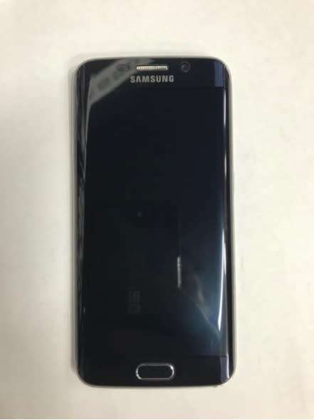 SAMSUNG GALAXY S6 EDGE (USED 64GB) (passes as new) stil plastics