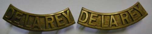 Regiment De la Rey Brass Shoulder Titles Pair