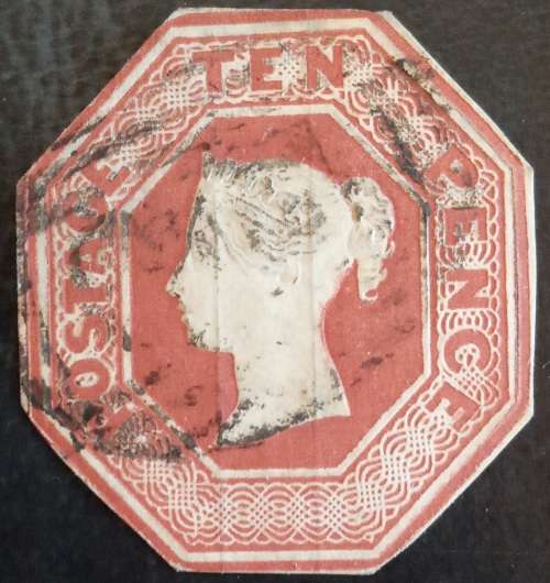 1847 Great Britain embossed 10d used with clear silk threads. Catalogue R30000.