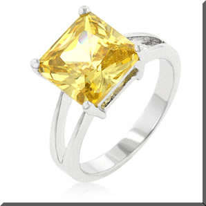 WHITE GOLD RHODIUM PLATED  WITH YELLOW CZ RING SIZE  7