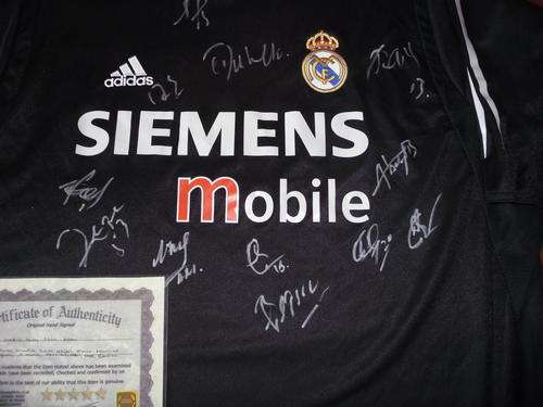 Real Madrid away Squad signed football / soccer shirt + COA RARE