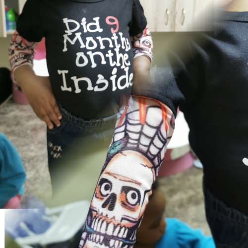 Cutest baby vest for a baby boy tattooed arms