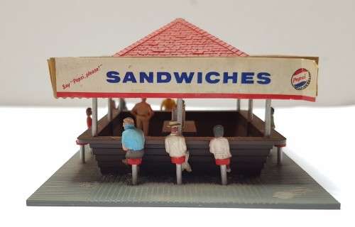 Hamburger Kiosk with 9 people included.