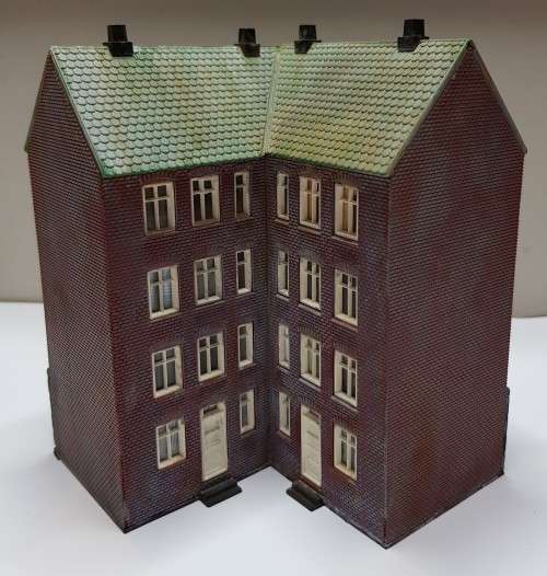 Medium high end block of flats/apartments. [Corner building]