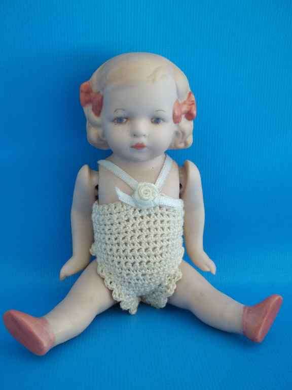Fully Jointed Ceramic Baby Doll - Length 15,5cm