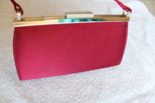 Red shiny evening handbag