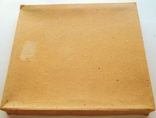 A small thin box of worldwide stamps on paper - good value!