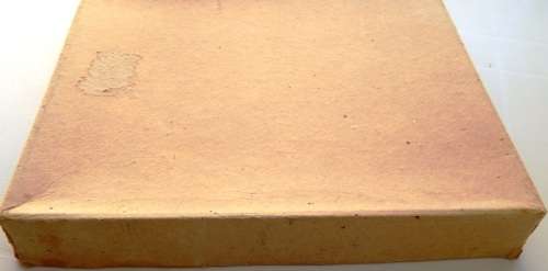 A small thin box of worldwide stamps on paper - good value!