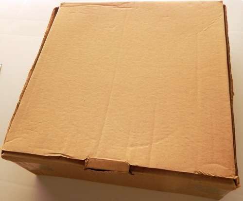 A box full of British QEII stamps on paper - 270X280X110mm - This is a heavy box!