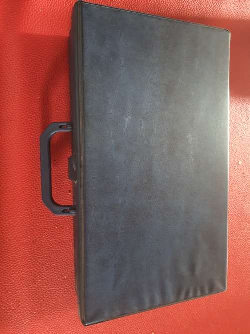 Cassette Tapes in a Vintage bag