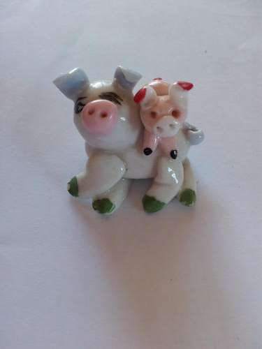 Cute little mommy and baby pig