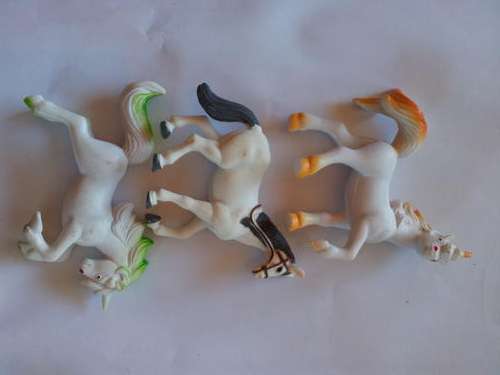 Lot of one horse and two unicorns