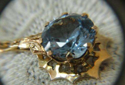 9CT GOLD AND BLUE TOPAZ EARRINGS AND PENDANT