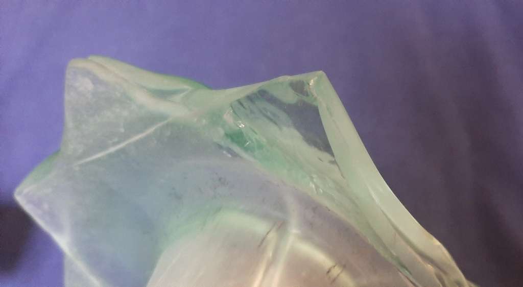 LARGE GREEN GLASS PETAL VASE WITH ORNATE METAL STAND