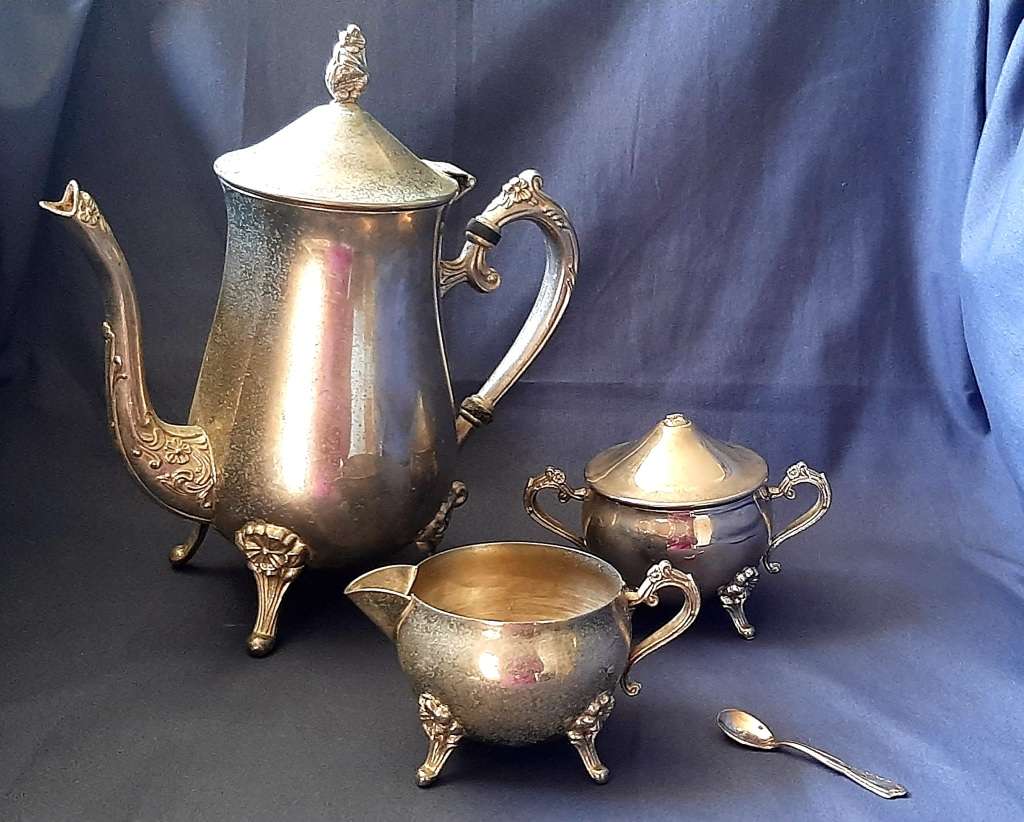 ORNATE SILVER-PLATED TEA SET