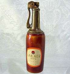 A vintage bottle shaped lighter