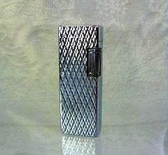 A vintage lighter - marked M