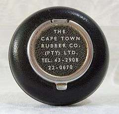 A vintage advertising pocket ashtray