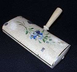 A vintage crumb roller brush or DUMB WAITER - made in France