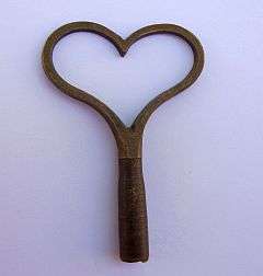 An antique clock key