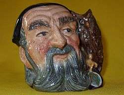 A ROYAL DOULTON MERLIN TOBY JUG