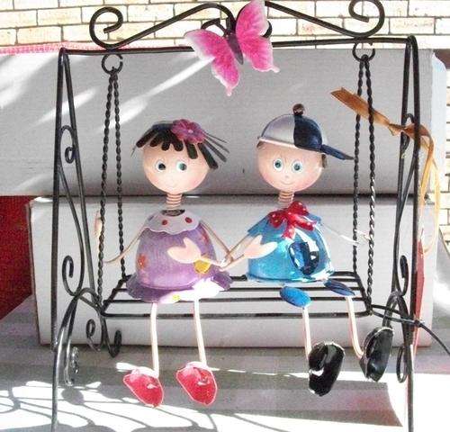 LOVELY IRON DOLL * SITTING ON A IRON SWING * COMBINE AND SAVE ON SHIPPING * LATE ENTRY
