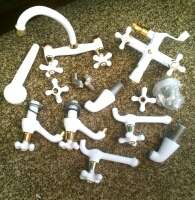 Full Set of White and Gold Bathroom Taps