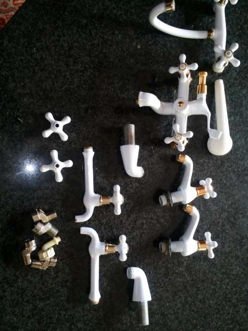 Full Set of White and Gold Bathroom Taps