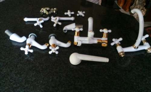 Full Set of White and Gold Bathroom Taps