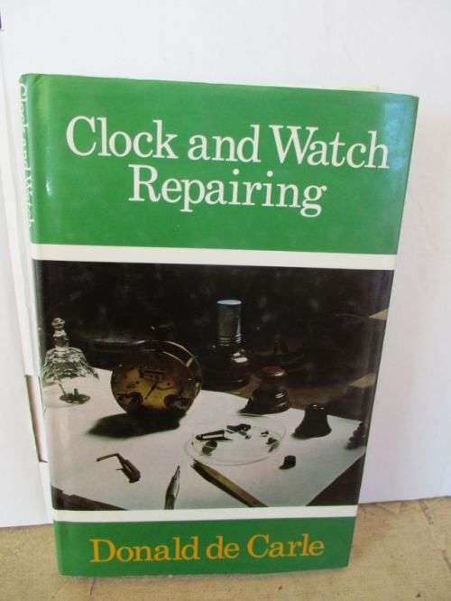 CLOCK AND WATCH REPAIRING----DONALD DE CARLE