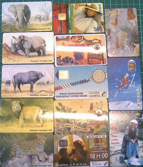 Variety of 13 phone cards, mostly South African