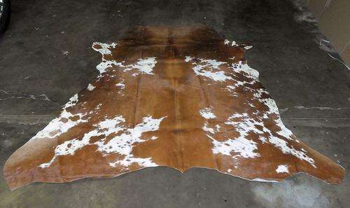 A grade brown and white Nguni skin
