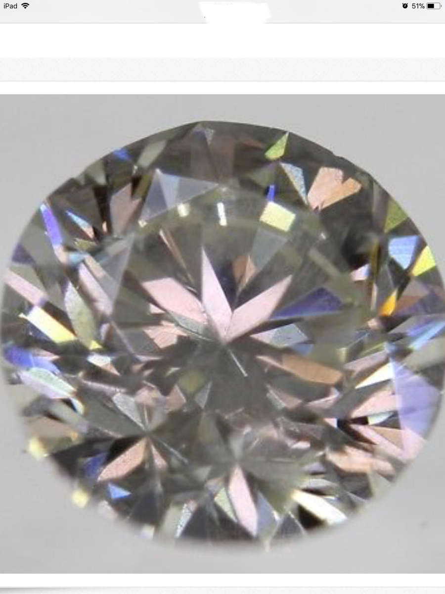 IGL Certified:0.59 Carat H Color SI1 Round Brilliant Natural Loose Diamond 5.23m