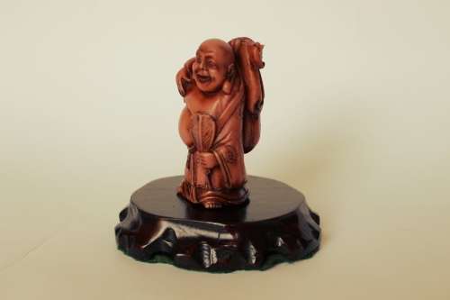 Vintage Hotei Laughing Buddha With Money Bag and Fan Resin Figurine on Wood Display Stand c1950s EUC
