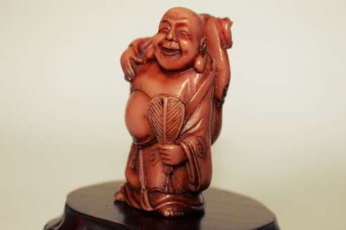 Vintage Hotei Laughing Buddha With Money Bag and Fan Resin Figurine on Wood Display Stand c1950s EUC