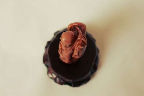 Vintage Hotei Laughing Buddha With Money Bag and Fan Resin Figurine on Wood Display Stand c1950s EUC