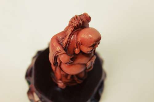 Vintage Hotei Laughing Buddha With Money Bag and Fan Resin Figurine on Wood Display Stand c1950s EUC