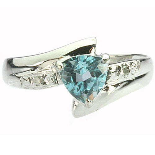 **R6 000.00**10KT WHITE GOLD BLUE TOPAZ AND DIAMOND RING
