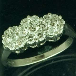 **R40 000.00**Stunning Flower design - 1.5 ctw. Diamond 10K White Gold Ring