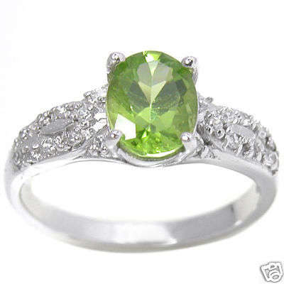 TOTAL CTW 2.13 WITH  1.3CT GENUINE NATURAL GREEN PERIDOT 9K W GOLD RING