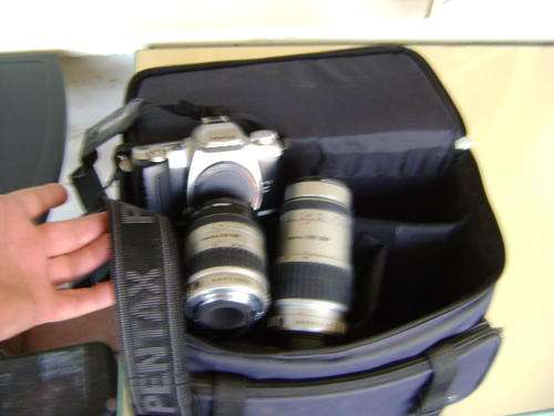 PENTAX MZ 50 FILM CAMERA + PENTAX 100-300 MM LENS +PENTAX 28-80MM LENS PLUS BATTERY PACK + REMOTE