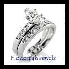 **FREE R50.00 gift**1 carat clear CZ  diamond cladded in 14kt white gold wedding ring size 10