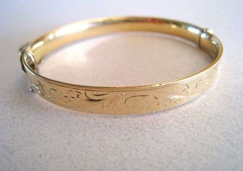 Beautiful L W & G 9ct gold bronze core Lagarmic Bangle