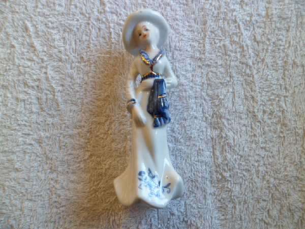 Porcelain Figure of a Young Girl