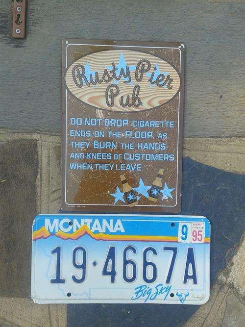 Unusual Number Plate and Bar Sign